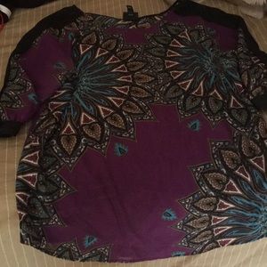 Dressy purple top with paisley type of pattern